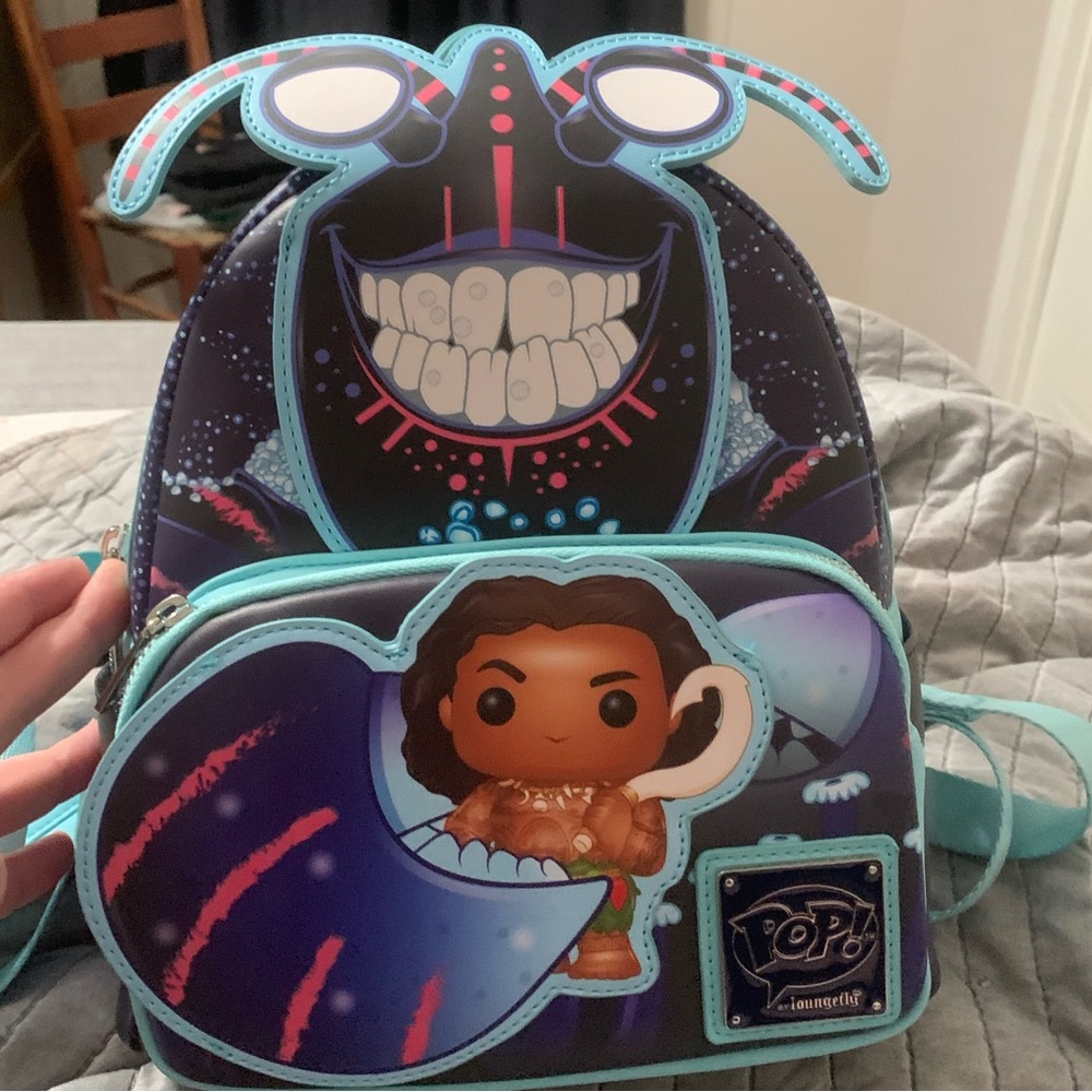 Loungefly Disney Maui and Tomatoa Glow in the dark backpack exclusive.